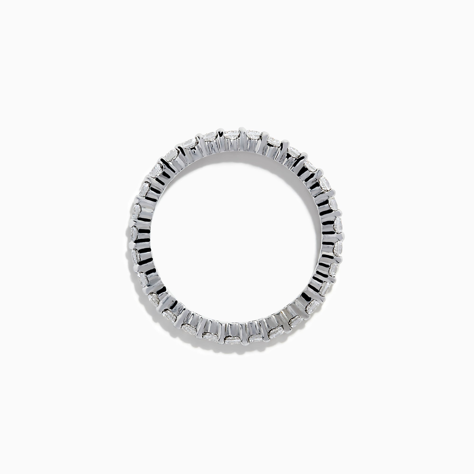 The 14K White Gold Prong Set Diamond Eternity Band, 1.00 TCW, showcases a continuous row of round white diamonds in a prong set design, shown on a white background.