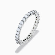 The 14K White Gold Prong Set Diamond Eternity Band, 1.00 TCW, showcases a continuous row of round white diamonds in a prong set design, shown on a white background.