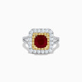 The 18K 2-Tone Gold Ruby, Yellow and White Diamond Double Halo Ring features a square ruby center, surrounded by yellow and white diamonds, set on a silver band with diamond accents.
