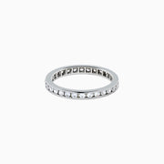The 14K White Gold Channel Set Diamond Eternity Band, 0.50 TCW, features round diamonds in a continuous channel setting encircling the band, shown on a white background.