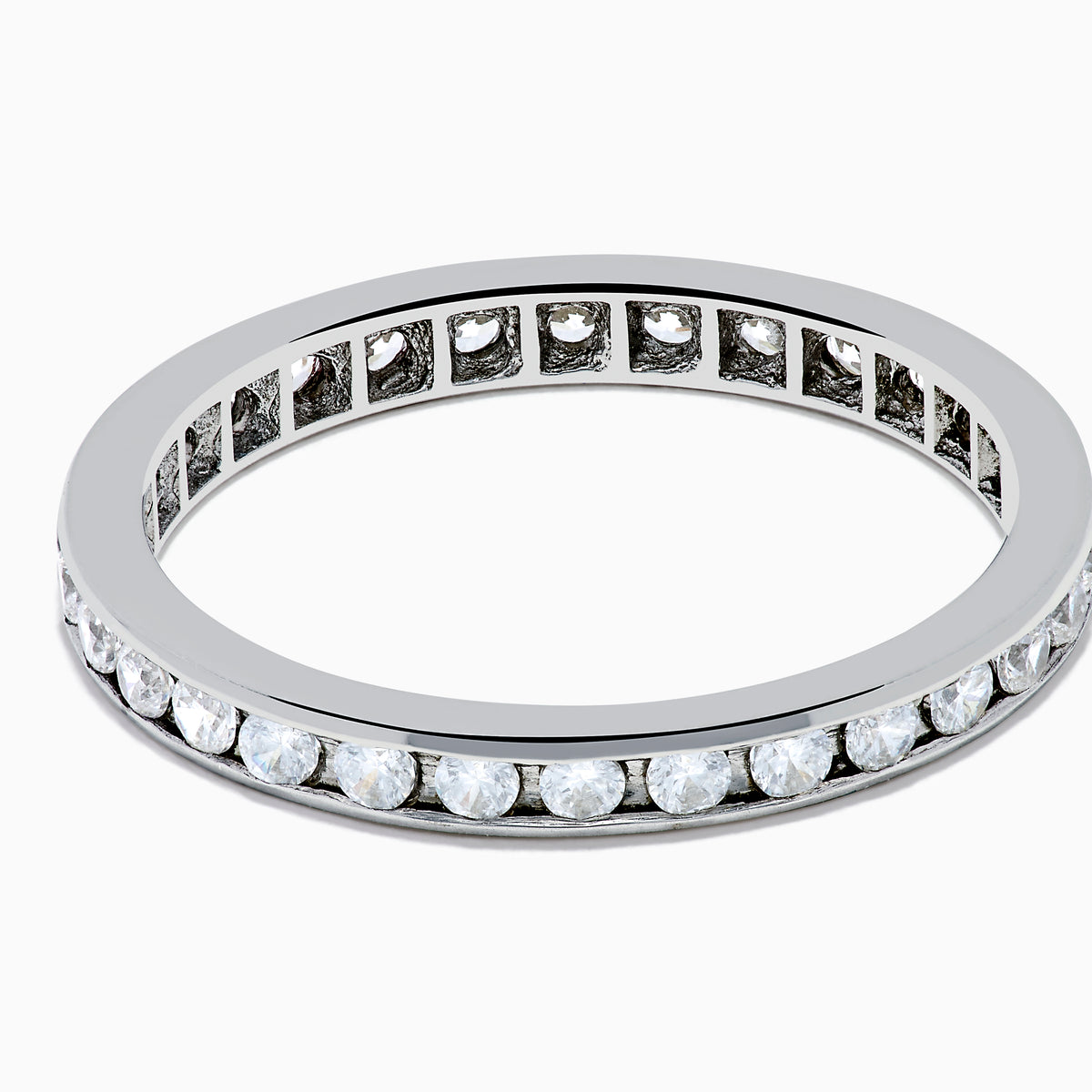 The 14K White Gold Channel Set Diamond Eternity Band, 0.50 TCW, features round diamonds in a continuous channel setting encircling the band, shown on a white background.