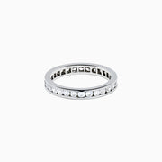 The 14K White Gold Channel Set Diamond Eternity Band, 1.00 TCW, showcases a seamless row of round diamonds in a channel setting for elegant sparkle against polished white gold.