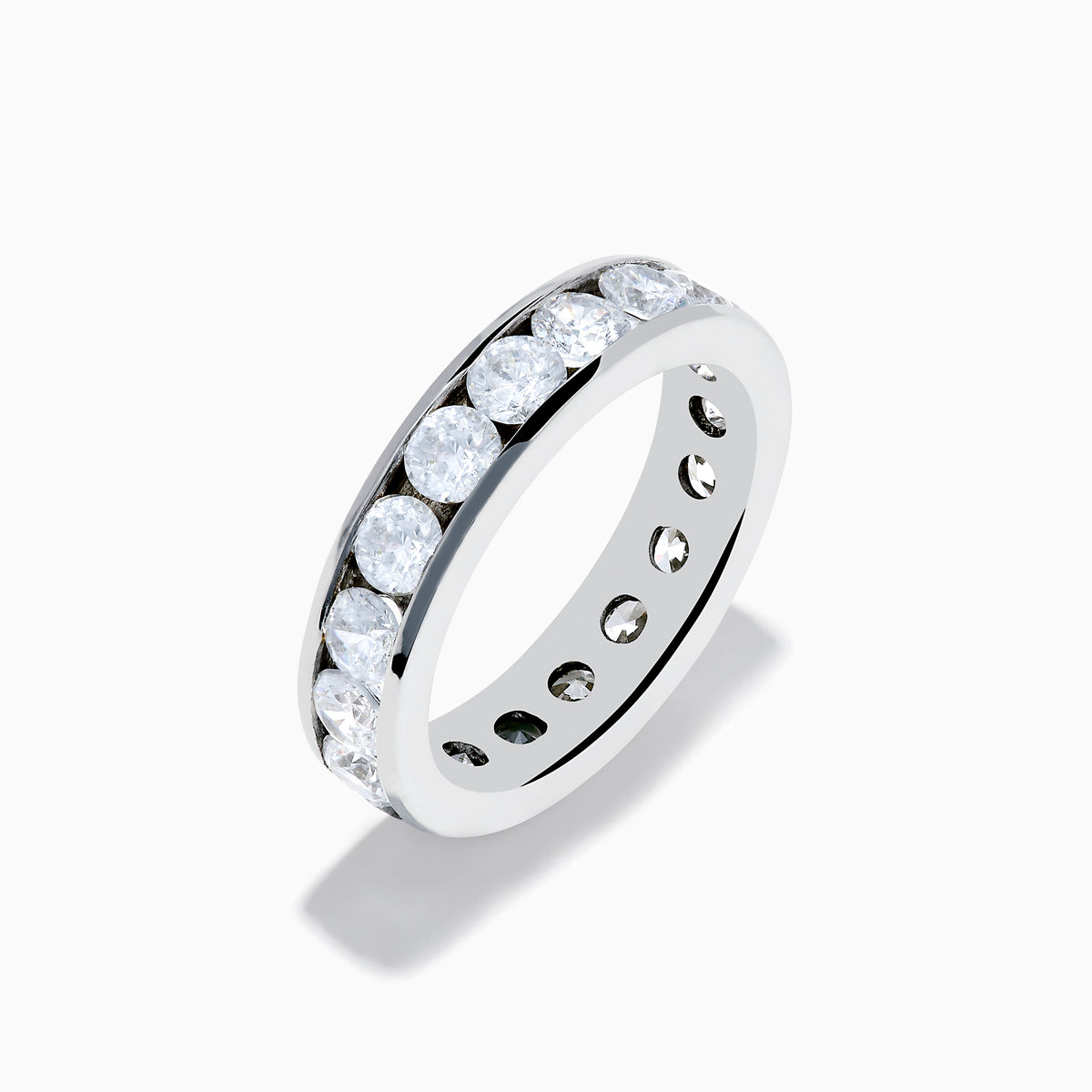 The 14K White Gold Channel Set Diamond Eternity Band, 3.00 TCW, features large round-cut diamonds evenly channel set around the ring and is shown on a plain white background.