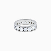 The 14K White Gold Channel Set Diamond Eternity Band, 4.00 TCW, features brilliant round diamonds all around and is elegantly showcased on a plain white background.