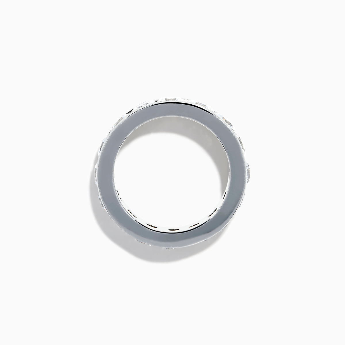 The 14K White Gold Channel Set Diamond Eternity Band, 4.00 TCW, features brilliant round diamonds all around and is elegantly showcased on a plain white background.
