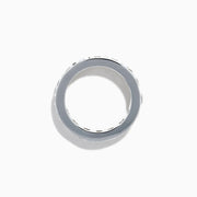 The 14K White Gold Channel Set Diamond Eternity Band, 4.00 TCW, features brilliant round diamonds all around and is elegantly showcased on a plain white background.