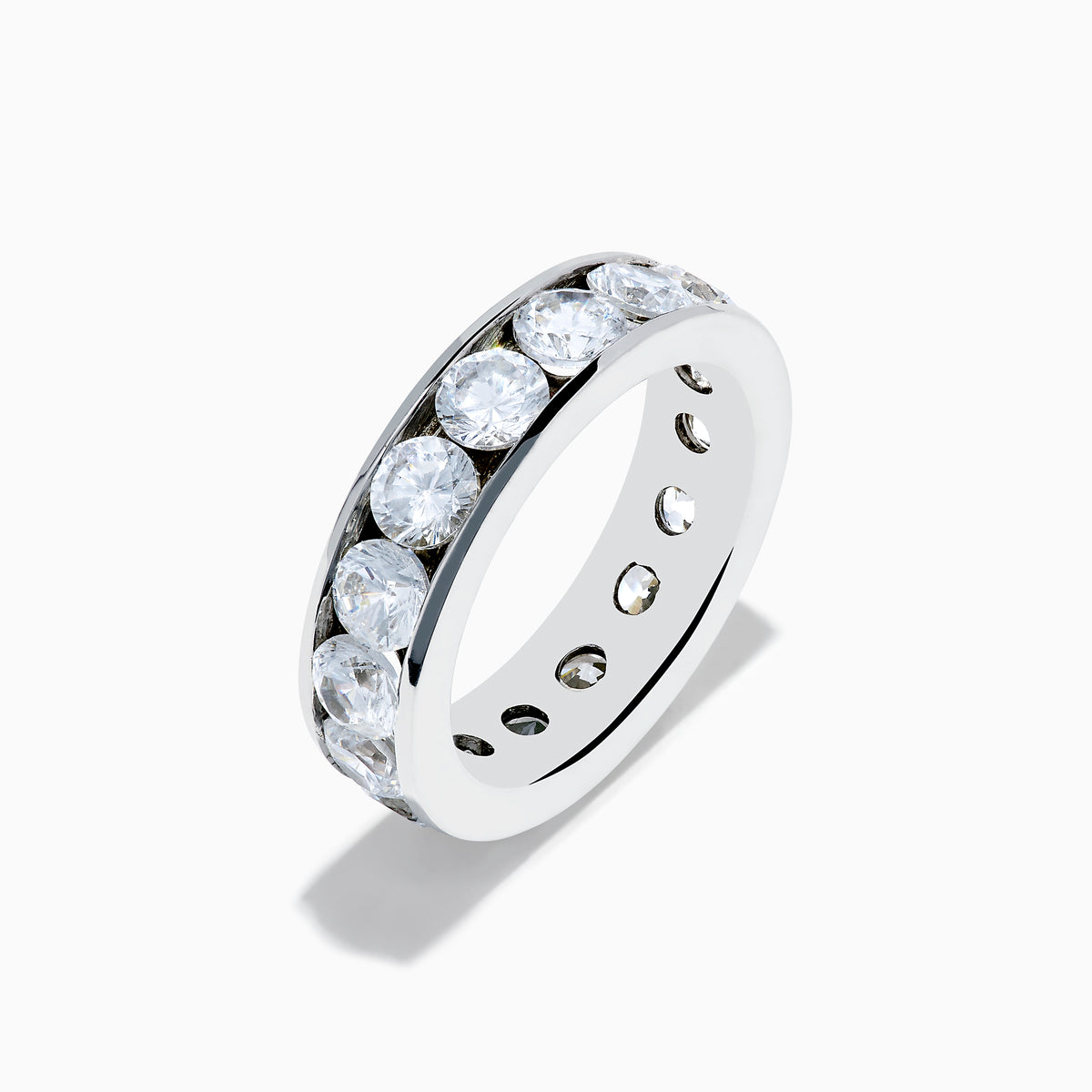 The 14K White Gold Channel Set Diamond Eternity Band, 4.00 TCW, features brilliant round diamonds all around and is elegantly showcased on a plain white background.