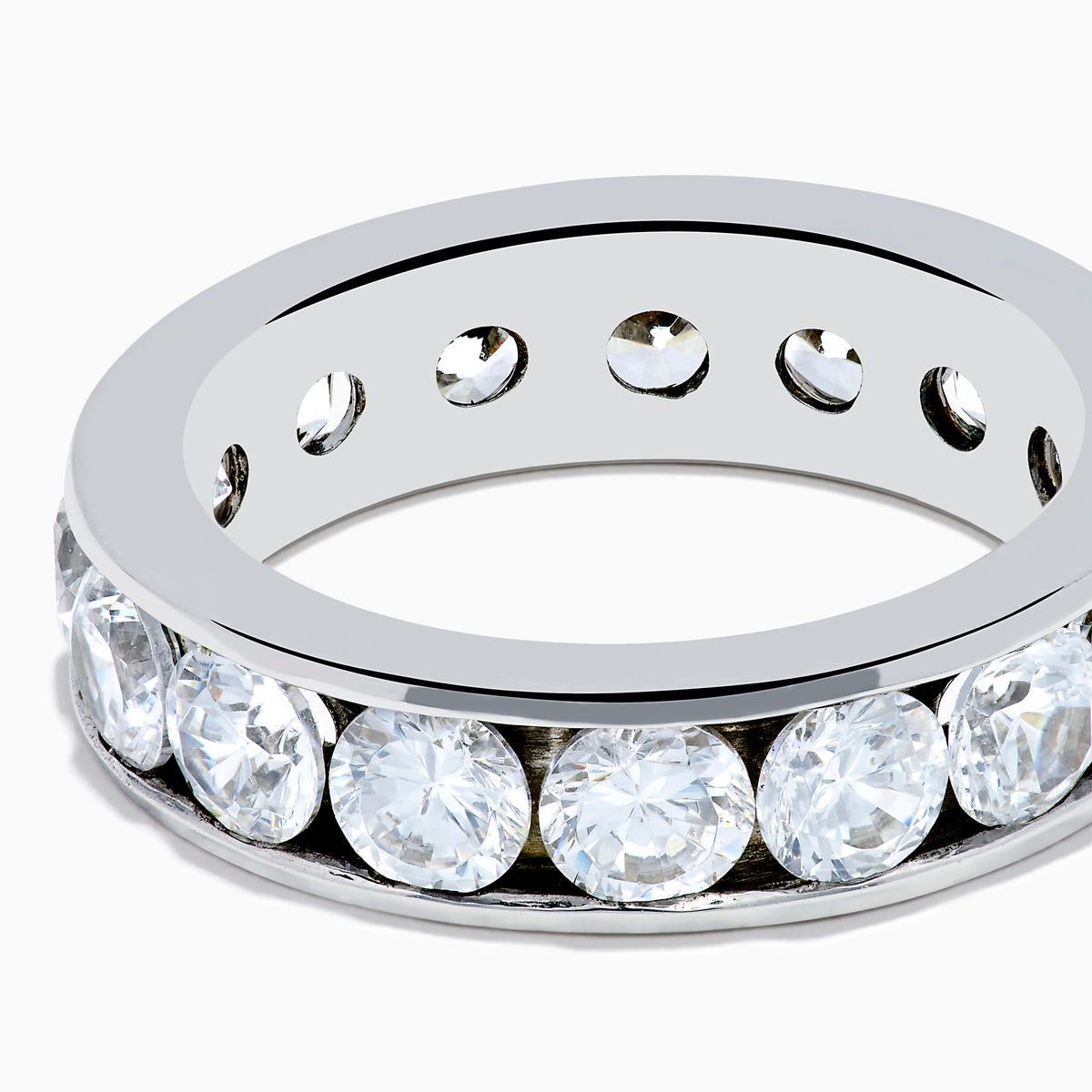 The 14K White Gold Channel Set Diamond Eternity Band, 4.00 TCW, features brilliant round diamonds all around and is elegantly showcased on a plain white background.