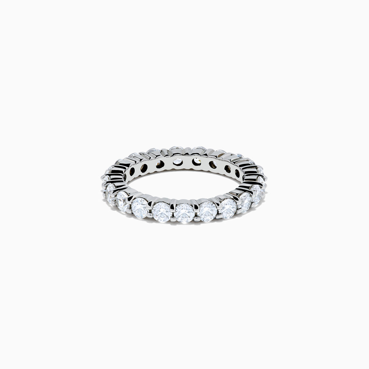 The 14K White Gold Prong Set Diamond Eternity Band, 2.00 TCW, features round clear diamonds encircling the ring and is displayed on a plain white background.