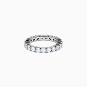 The 14K White Gold Prong Set Diamond Eternity Band, 2.00 TCW, features round clear diamonds encircling the ring and is displayed on a plain white background.