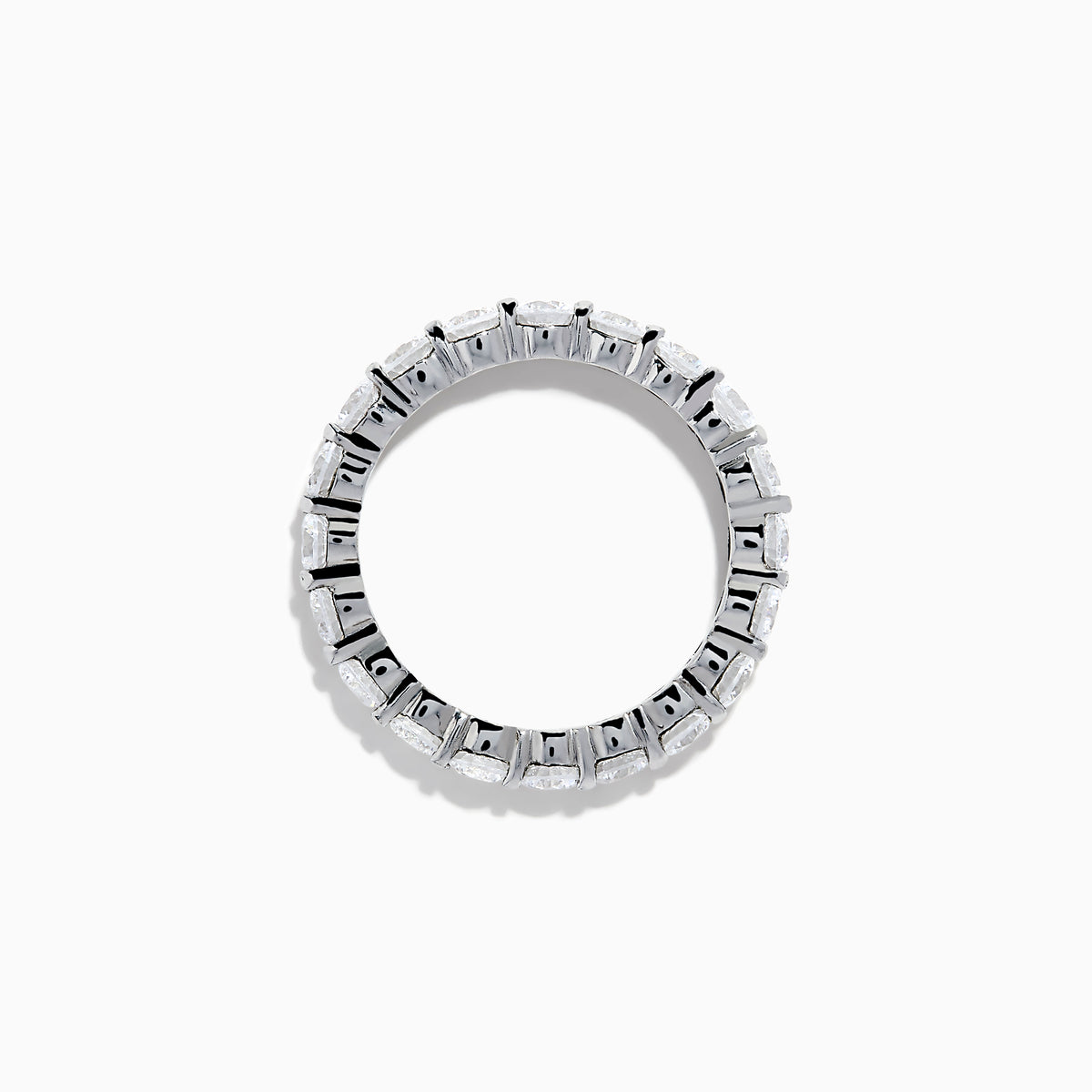 The 14K White Gold Prong Set Diamond Eternity Band, 3.00 TCW, features round diamonds encircling the band and is shown on a plain white background.