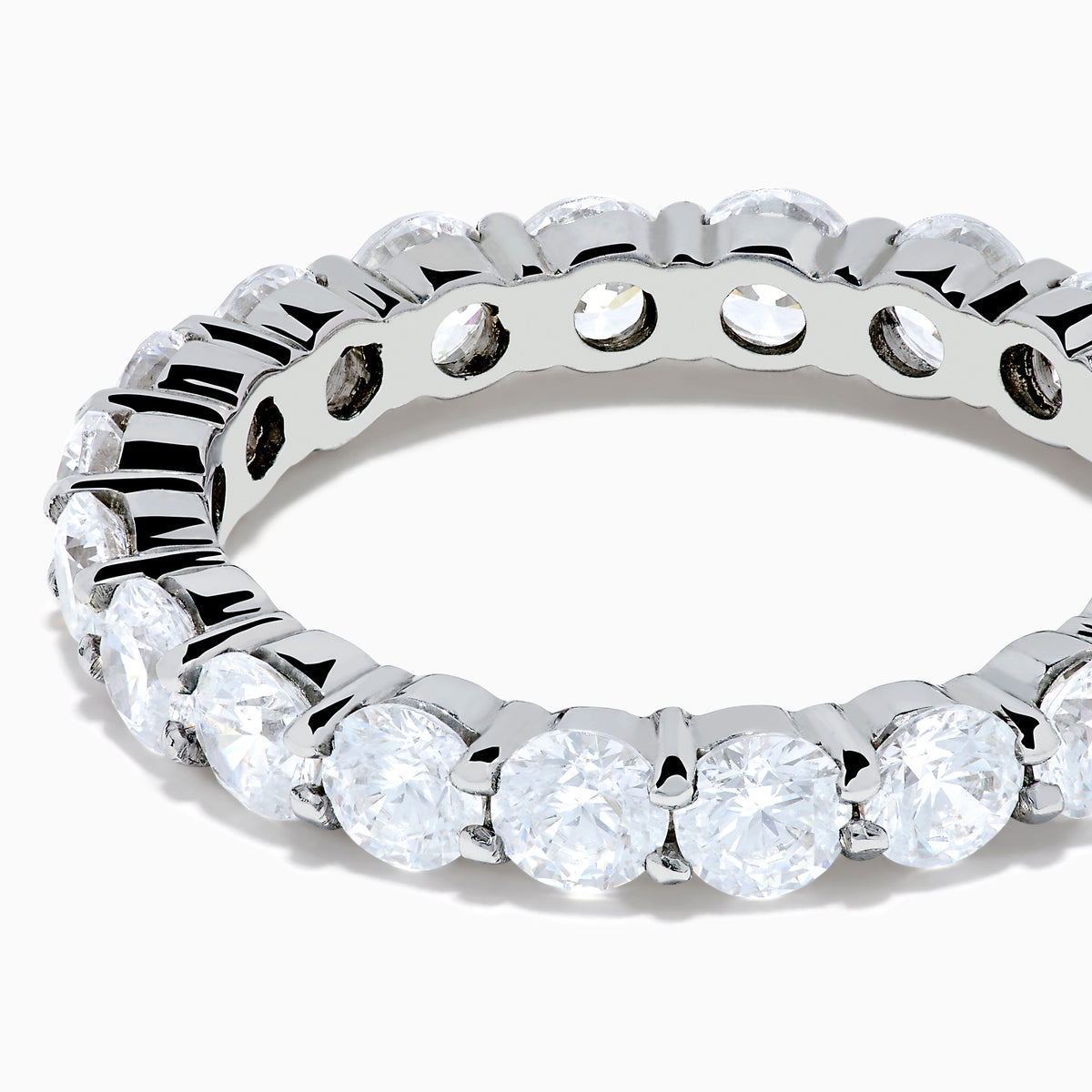 The 14K White Gold Prong Set Diamond Eternity Band, 3.00 TCW, features round diamonds encircling the band and is shown on a plain white background.