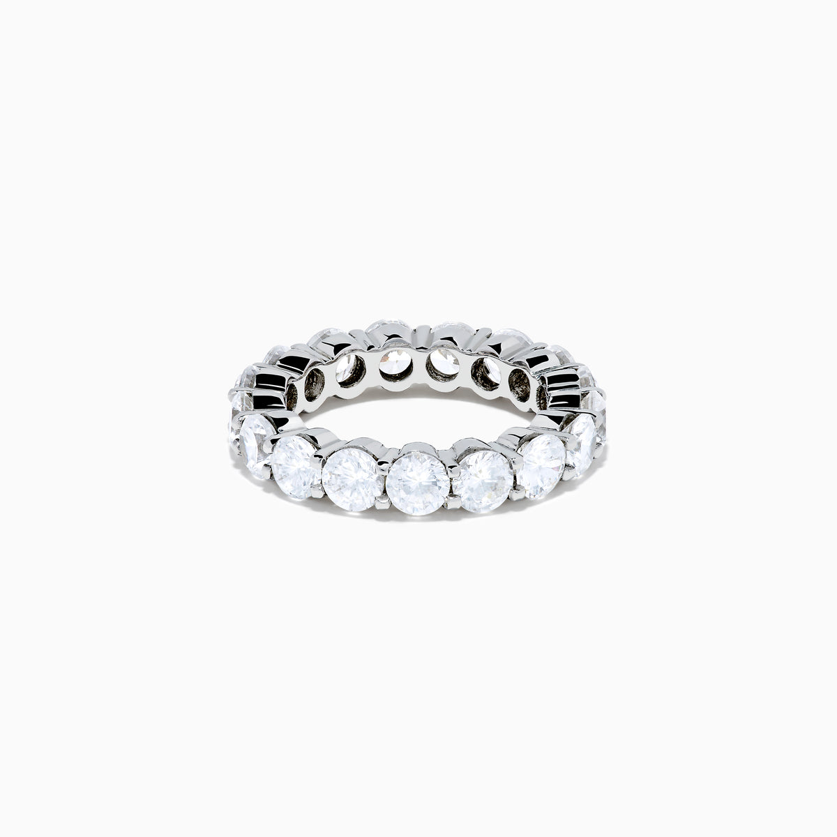 The 14K White Gold Prong Set Diamond Eternity Band, 4.00 TCW, showcases a seamless row of round white diamonds in prong settings, crafted in stunning 14K white gold and presented on a plain white background.