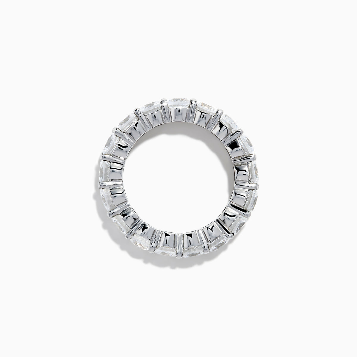 The 14K White Gold Prong Set Diamond Eternity Band, 4.00 TCW, showcases a seamless row of round white diamonds in prong settings, crafted in stunning 14K white gold and presented on a plain white background.