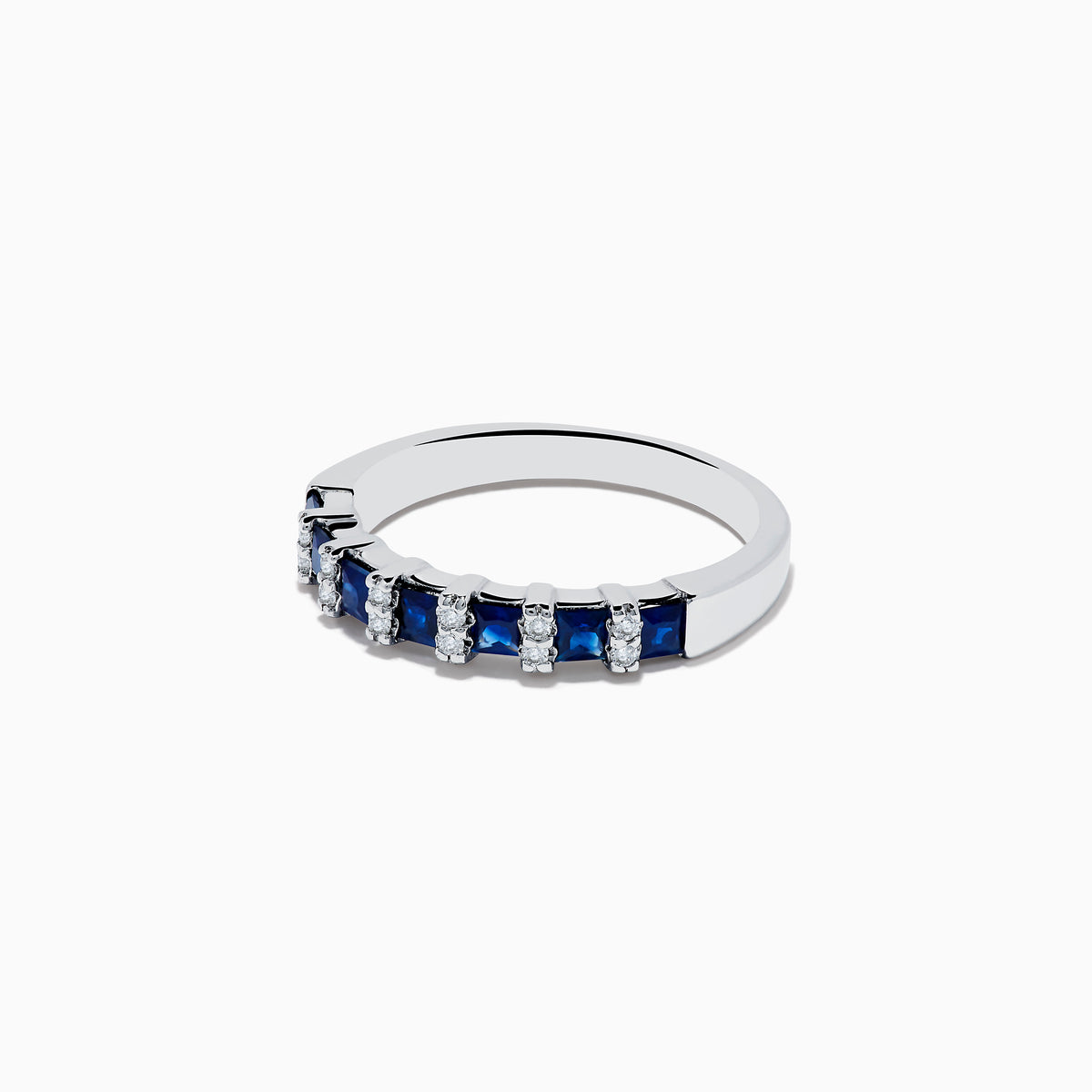 The Royale Bleu 14K White Gold Sapphire and Diamond Ring, 0.95 TCW, features alternating blue sapphire and white diamond stones set in a row along the band, displayed against a plain white background.