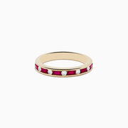 The Ruby Royal 14K Yellow Gold Ruby and Diamond Channel-Set Stacking Band, 0.72 TCW, features alternating round white diamonds and rectangular red rubies in a channel-set design, displayed on a plain white background.