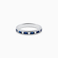 The 14K White Gold Channel-Set Blue Sapphire and Diamond Band 0.71 TCW features alternating blue sapphires and round white diamonds in a channel setting, shown against a plain white background.