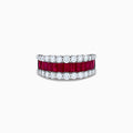 The Ruby Royale 14K White Gold Ruby and Diamond Wide Band showcases a central row of rectangular rubies flanked by sparkling round diamonds, all elegantly set in white gold against a plain white background.