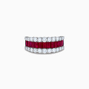 The Ruby Royale 14K White Gold Ruby and Diamond Wide Band showcases a central row of rectangular rubies flanked by sparkling round diamonds, all elegantly set in white gold against a plain white background.