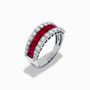 The Ruby Royale 14K White Gold Ruby and Diamond Wide Band showcases a central row of rectangular rubies flanked by sparkling round diamonds, all elegantly set in white gold against a plain white background.