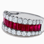 The Ruby Royale 14K White Gold Ruby and Diamond Wide Band showcases a central row of rectangular rubies flanked by sparkling round diamonds, all elegantly set in white gold against a plain white background.