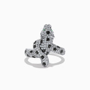 A stunning 14K White Gold Panther Ring adorned with white and black diamonds and vivid emerald eyes, shown against a white background.