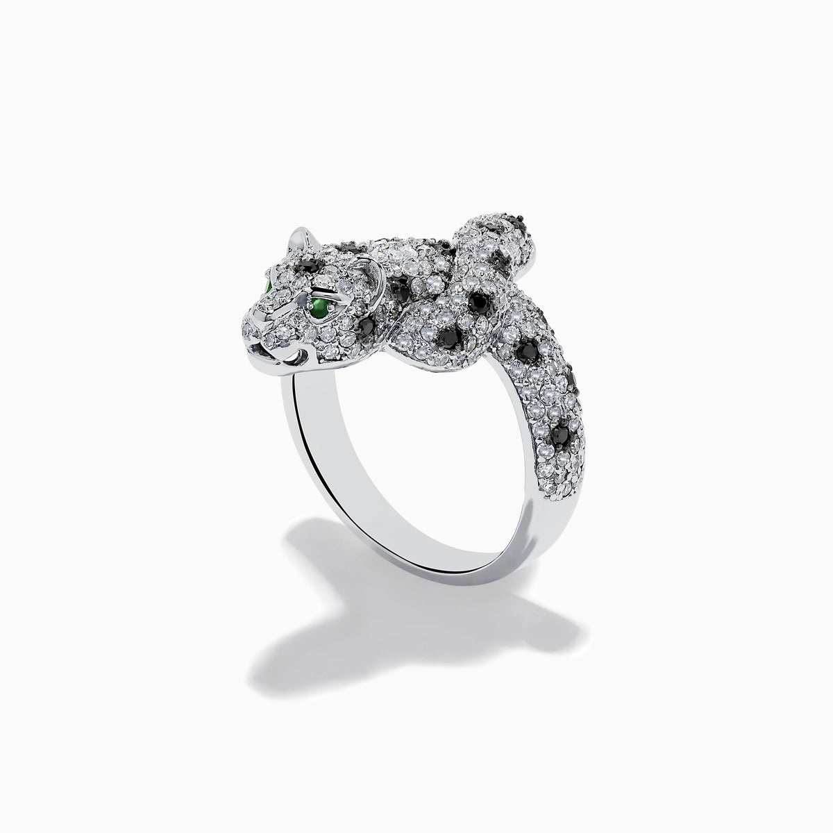 A stunning 14K White Gold Panther Ring adorned with white and black diamonds and vivid emerald eyes, shown against a white background.