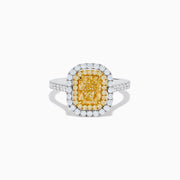 The 18K Gold Yellow and White Double Halo GIA Certified Diamond Ring showcases a large rectangular yellow diamond center, framed by double halos of round white diamonds and a diamond-adorned band.