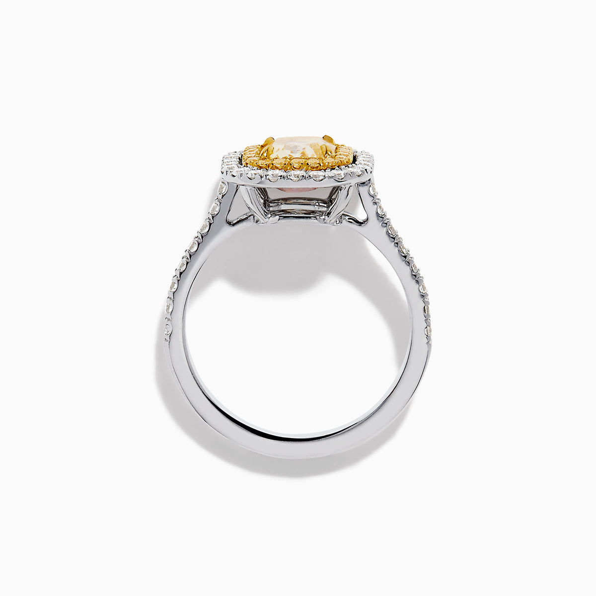 The 18K Gold Yellow and White Double Halo GIA Certified Diamond Ring showcases a large rectangular yellow diamond center, framed by double halos of round white diamonds and a diamond-adorned band.