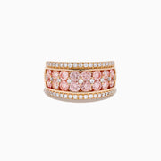 The Lab Grown Pink and White Diamond Statement Ring in 14K Rose Gold features a wide band with two rows of lab grown white diamonds on the edges and a central line of closely set pink diamonds for an elegant, eye-catching look.