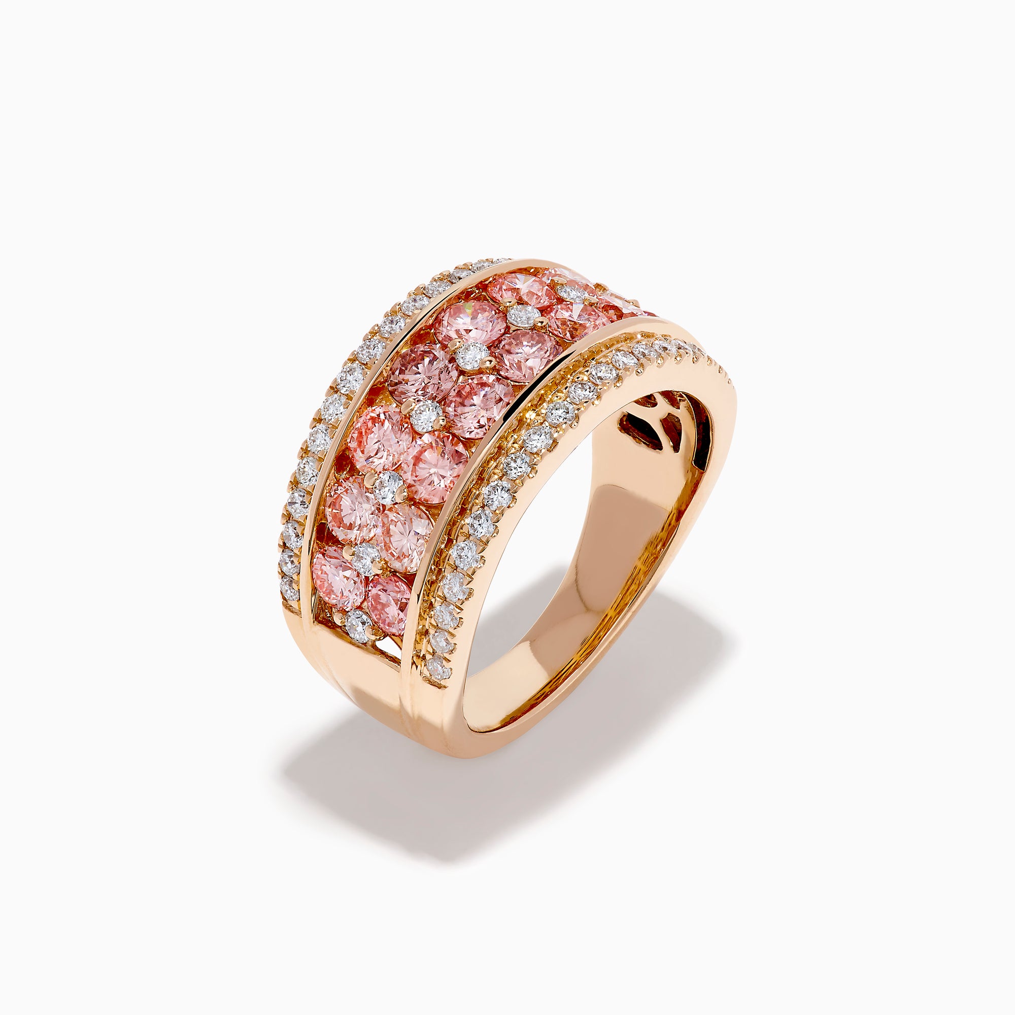 The Lab Grown Pink and White Diamond Statement Ring in 14K Rose Gold features a wide band with two rows of lab grown white diamonds on the edges and a central line of closely set pink diamonds for an elegant, eye-catching look.