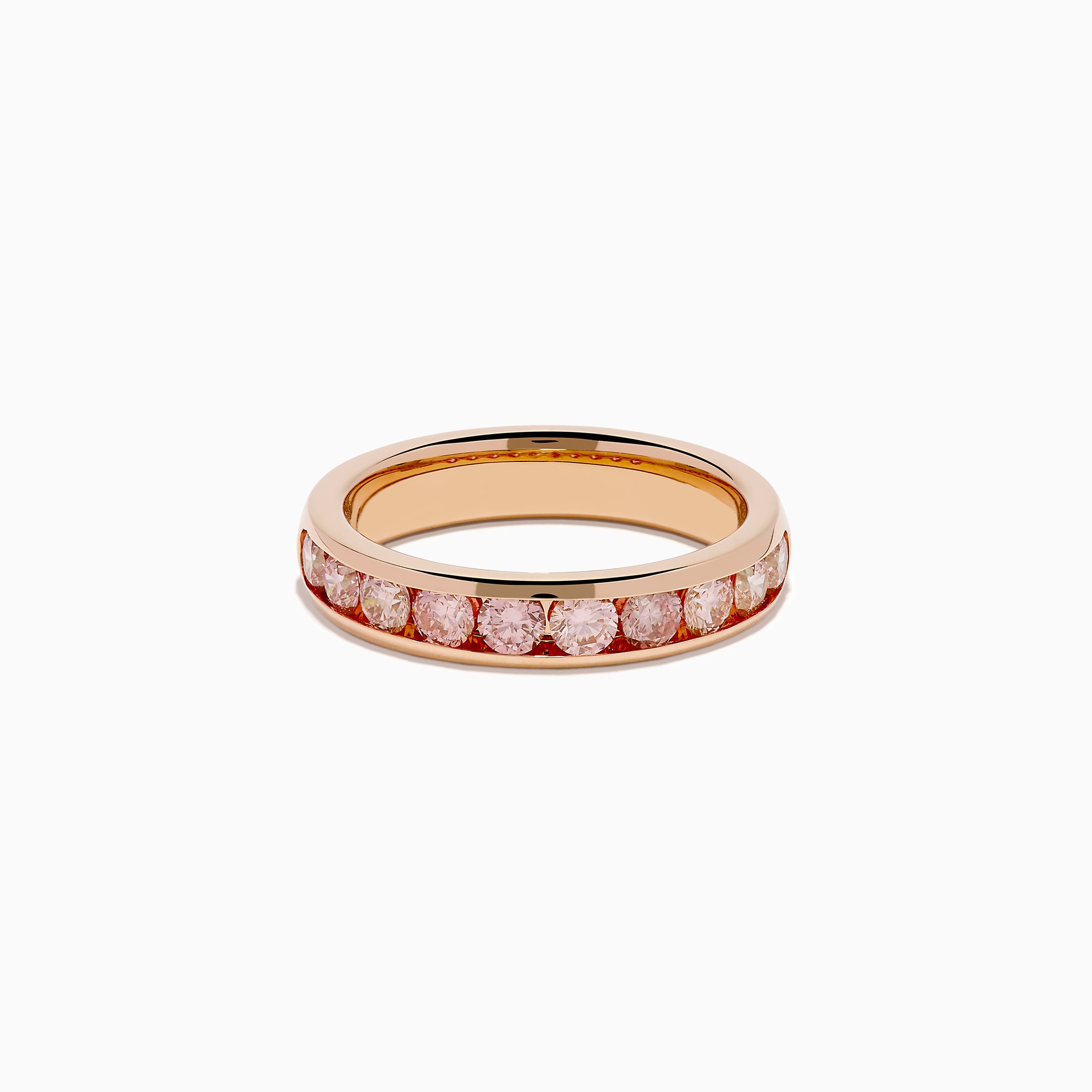 The Lab Grown Pink Diamond Channel Set Band in 14K Rose Gold features a row of round lab grown pink diamonds set in a channel band, shown against a plain white background.
