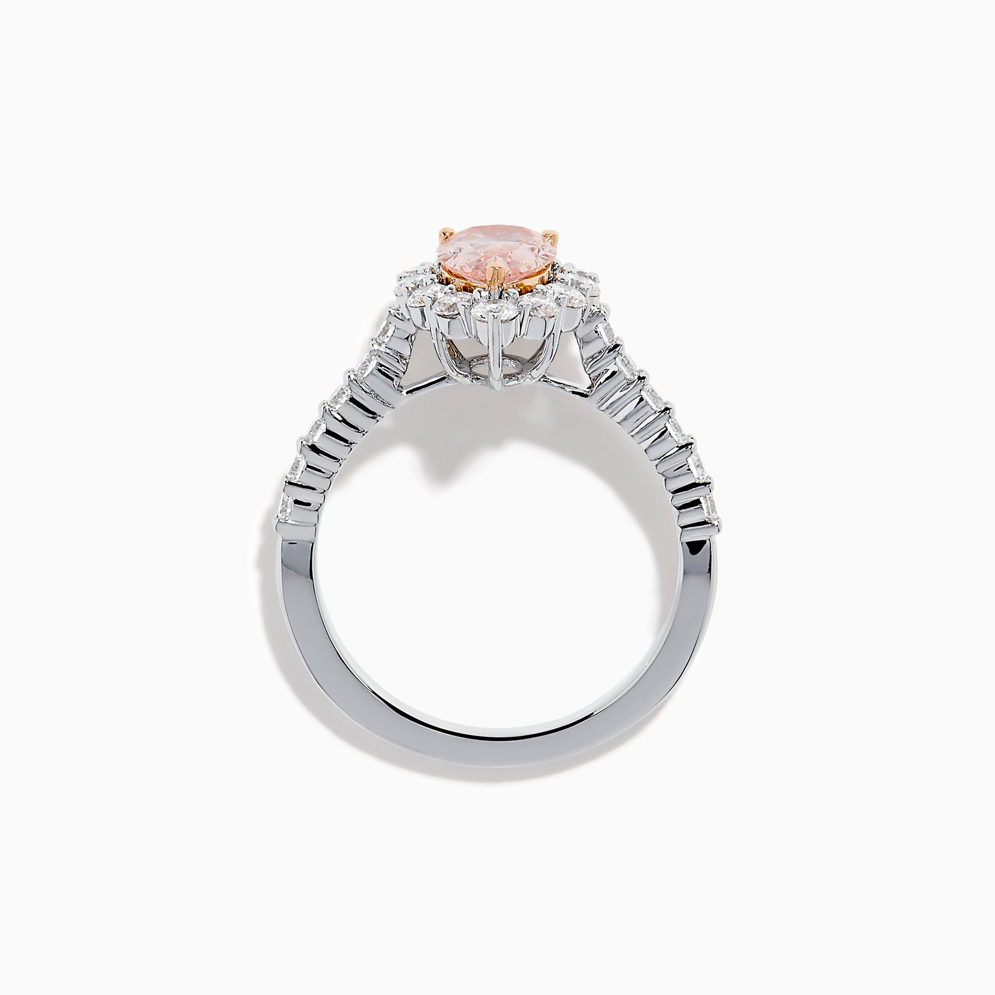 The Lab Grown Pink and White Diamond Halo Ring in 14K Two Tone Gold features a pear-shaped pink center, a halo of white diamonds, and a diamond-studded band, shown on a white background.