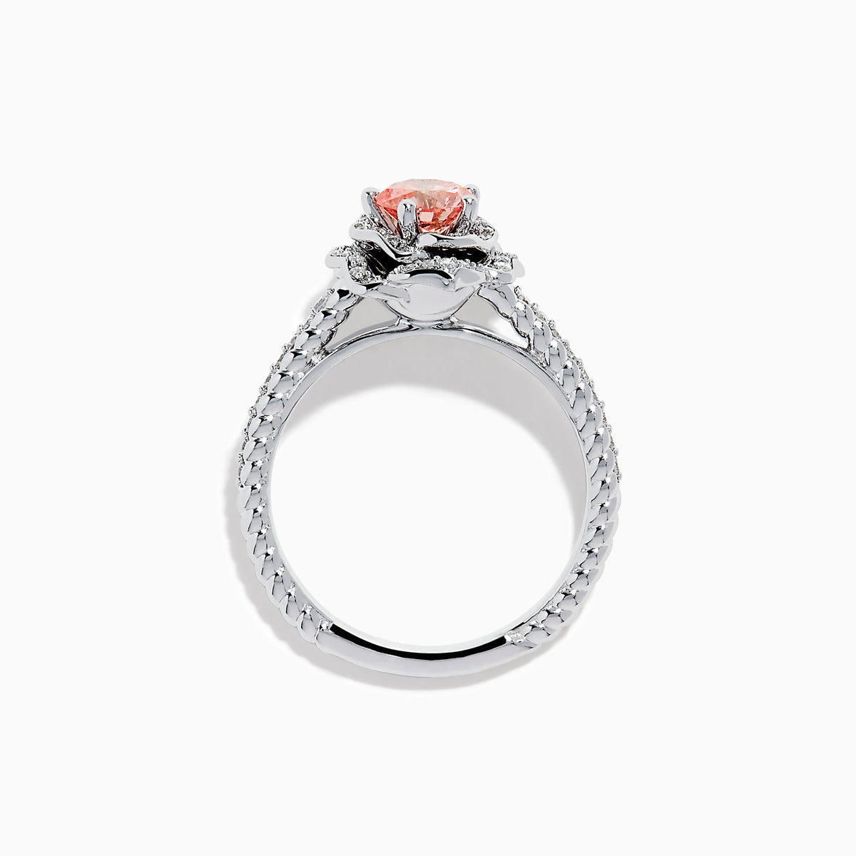The Lab Grown Pink and White Diamond Rose Ring in 14K White Gold features a round pink center stone, a floral halo of lab grown diamonds, and additional diamonds along the band.