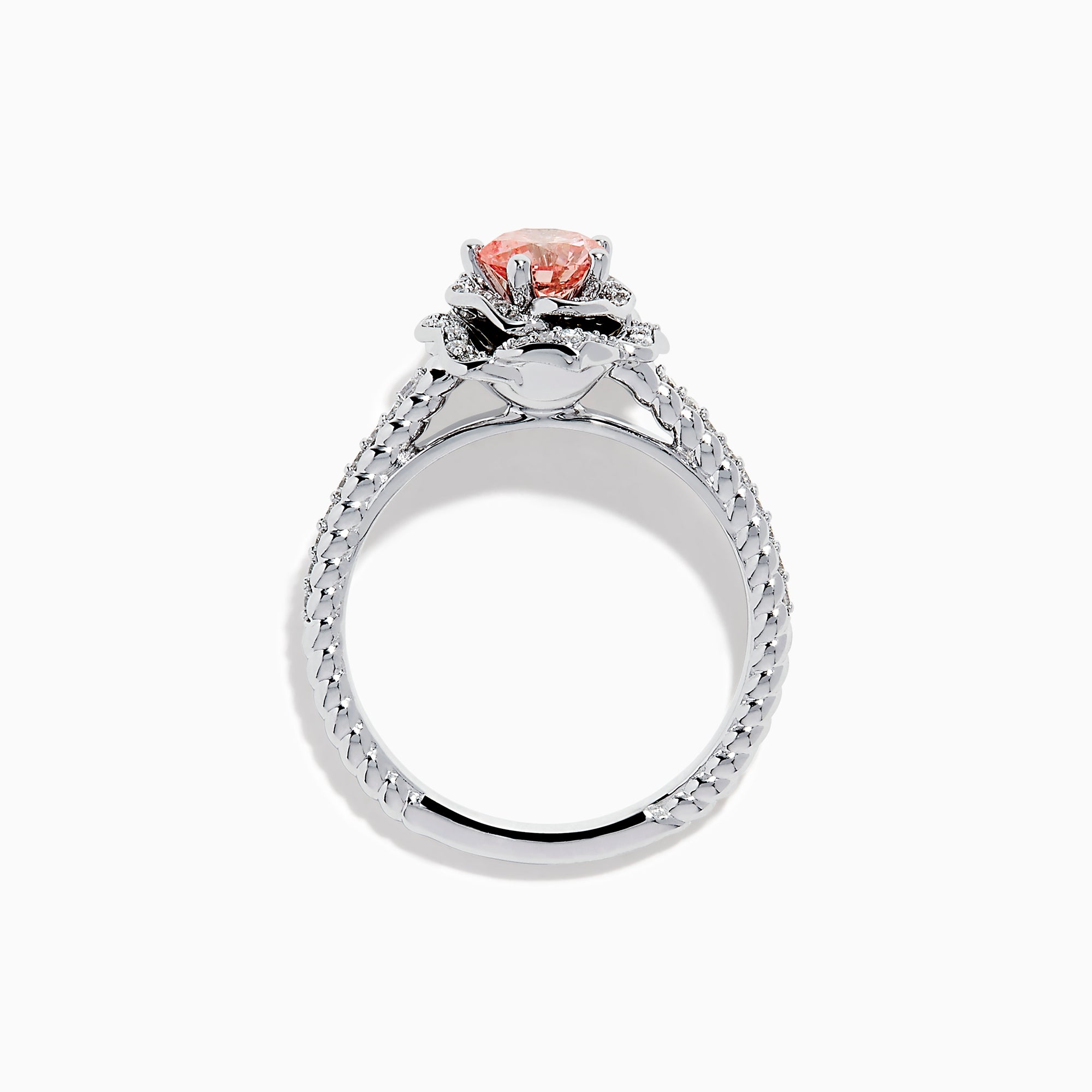The Lab Grown Pink and White Diamond Rose Ring in 14K White Gold features a round pink center stone, a floral halo of lab grown diamonds, and additional diamonds along the band.