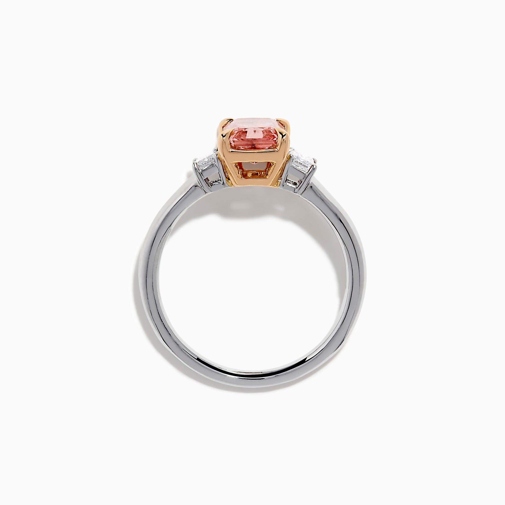 The Lab Grown Pink and White Diamond 3 Stone Ring in 14K White Gold features a rectangular pink and white diamond centerpiece with two clear baguette-cut side stones, set on a simple, elegant band.