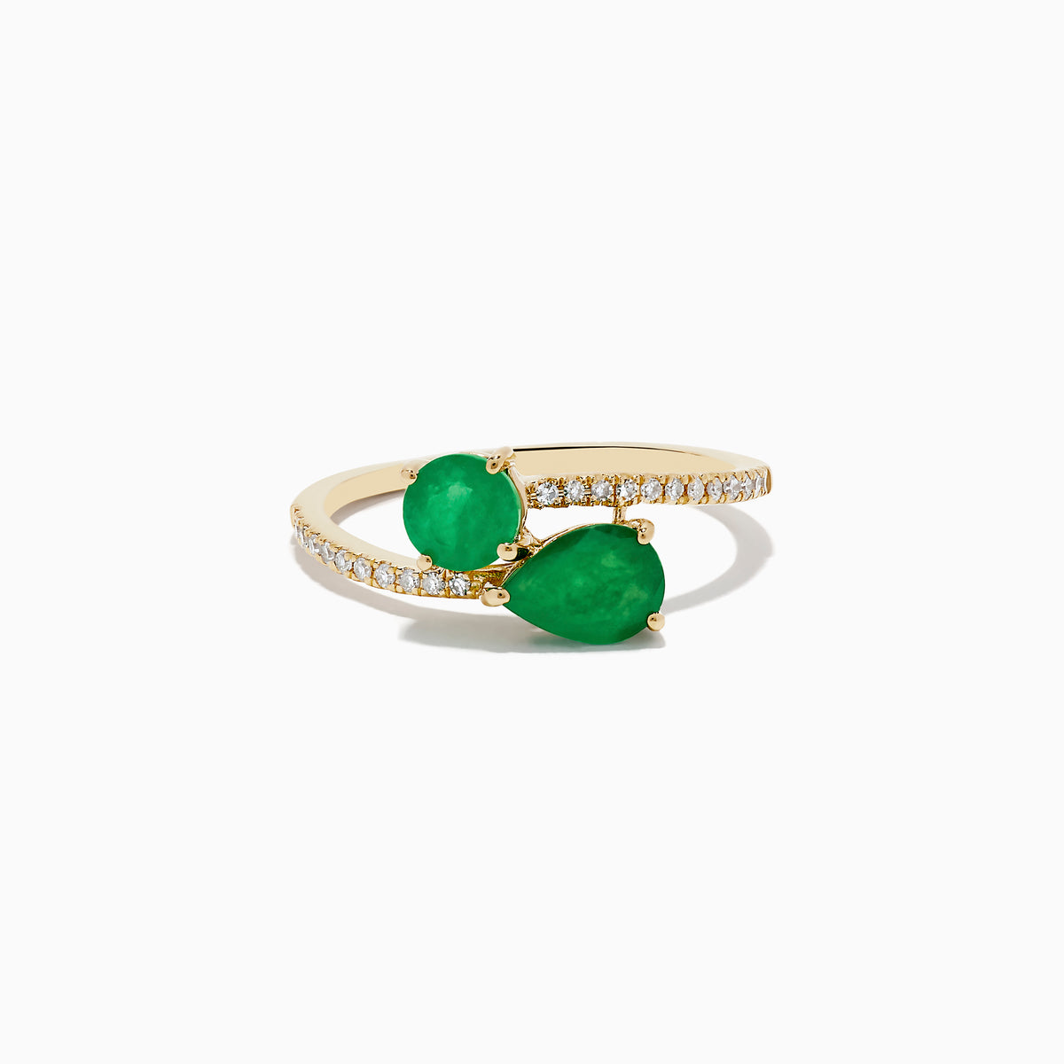 The Brasilica 14K Yellow Gold Emerald and Diamond Bypass Ring features two pear-shaped green emeralds set opposite each other on a curved band accented with sparkling diamonds.