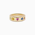 The Watercolors 14K Yellow Gold Multi Sapphire Wedding Band features five sapphires in square, rectangular, heart, oval, and round shapes set evenly around the band.