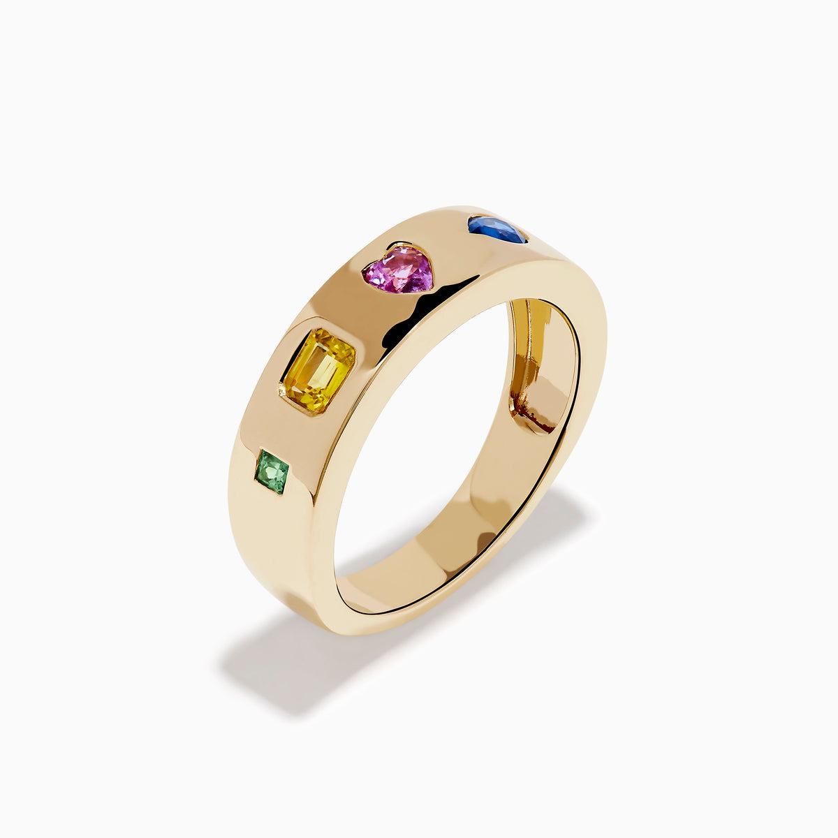 The Watercolors 14K Yellow Gold Multi Sapphire Wedding Band features five sapphires in square, rectangular, heart, oval, and round shapes set evenly around the band.