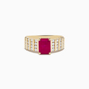 The Ruby Royale 14K Yellow Gold Ruby and Diamond Ring features a rectangular red ruby center, accented by three rows of small round diamonds on each side, all showcased against a white background.