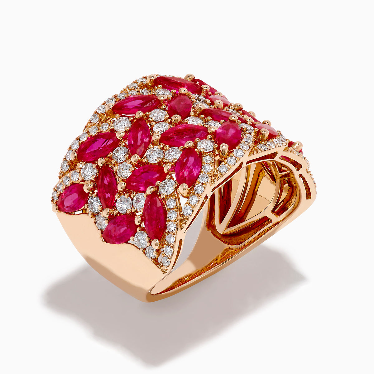 The 14K Rose Gold Marquise Ruby and Diamond Leaf Statement Ring showcases rows of marquise rubies and round white diamonds in an intricate overlapping leaf design.