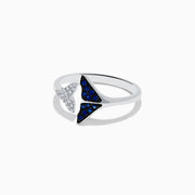 The Seaside 14K White Gold Sapphire and Diamond Whale Tails Ring (0.18 TCW) features two elegant tails, one adorned with diamonds and the other with sapphires, symbolizing oceanic grace.