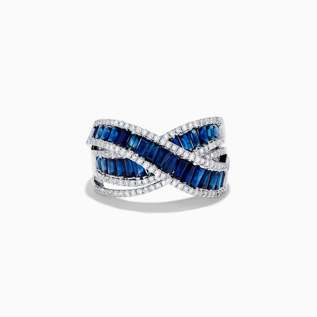 The Royale Bleu 14K White Gold Blue Sapphire and Diamond Crossover Ring features a crisscross design with rows of rectangular blue sapphires bordered by sparkling white diamonds.