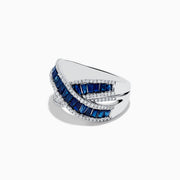The Royale Bleu 14K White Gold Blue Sapphire and Diamond Crossover Ring features a crisscross design with rows of rectangular blue sapphires bordered by sparkling white diamonds.