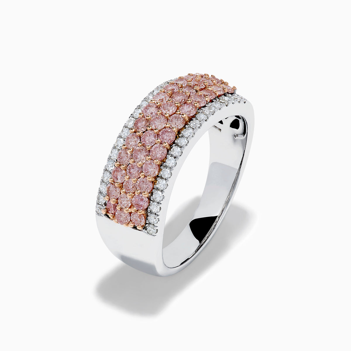 The 14K Two-Tone Gold Pink and White Diamond Ring showcases alternating rows of sparkling white and pink diamonds, blending the brilliance of white stones with the warmth of rose gold for an elegant, eye-catching look.