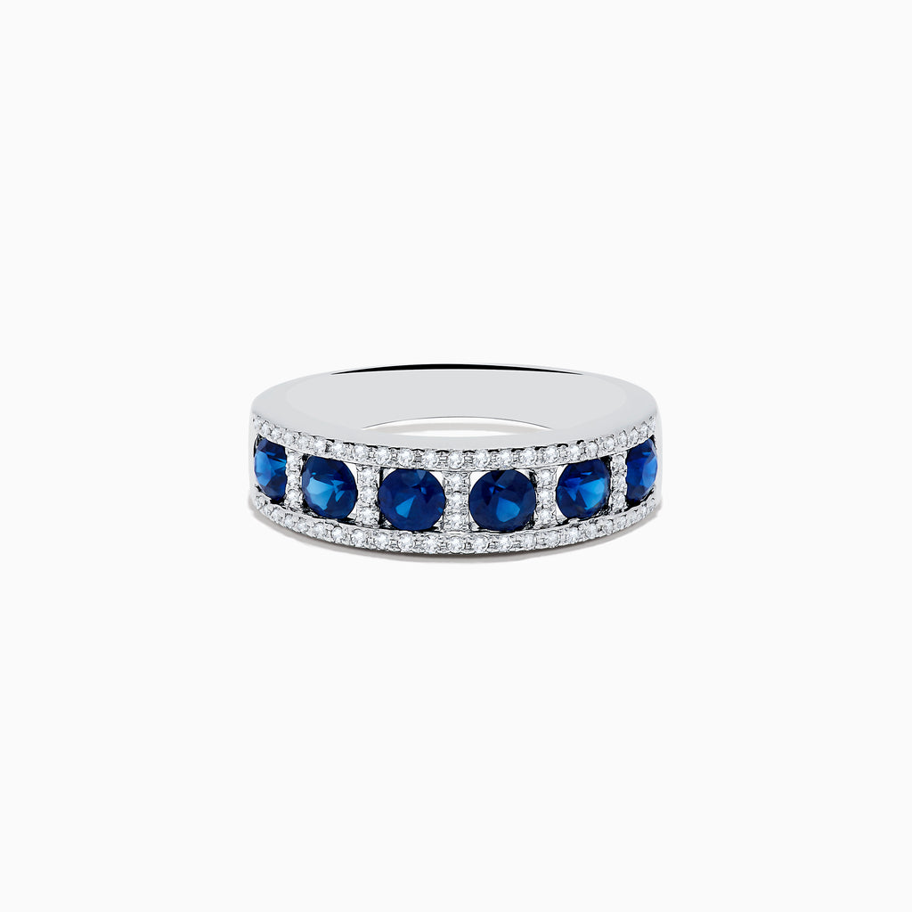 The Royale Bleu 14K White Gold Sapphire and Diamond Ring, 1.66 TCW, showcases round sapphires separated by diamonds in a wide band for a timeless, elegant look.