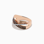 The 14K Rose Gold Espresso and White Diamond Ring, 0.48 TCW, features a crisscross design with rows of sparkling espresso and white diamonds set in overlapping bands for a striking look.