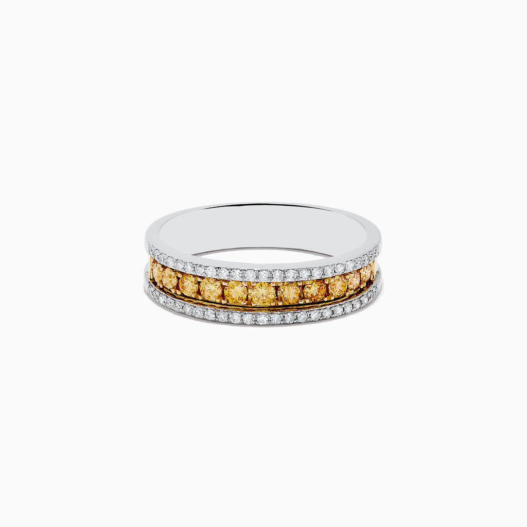 The Canare 14K Two Tone Gold Yellow and White Diamond Ring, 0.58 TCW, displays a central row of yellow diamonds bordered by white diamonds, elegantly showcased against a white background.