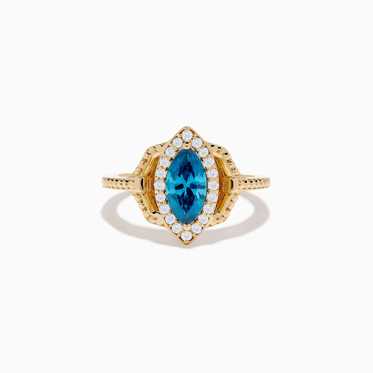 The 14K Yellow Gold Blue and White Diamond Marquise Ring features a striking blue and white diamond centerpiece, accented by a halo of round white diamonds and detailed band craftsmanship.