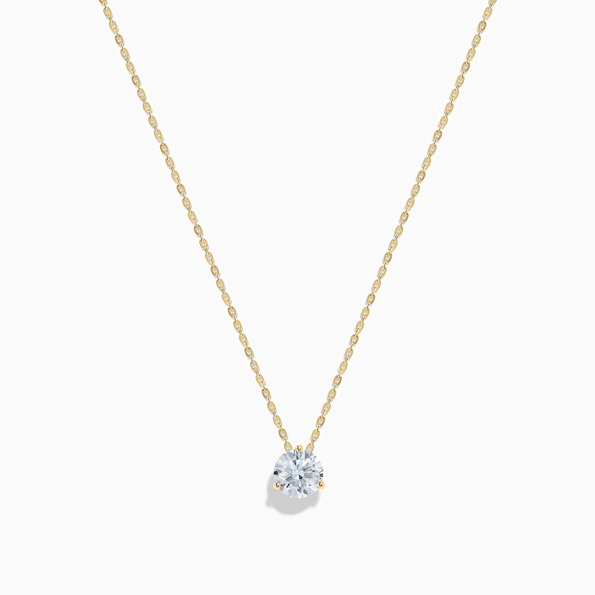 The Lab Grown Diamond Earring and Necklace Set in 14K Yellow Gold features a round diamond pendant and matching gold stud earrings, each showcasing a single round lab grown diamond, displayed on a white background.